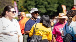 Monique Colvin talking with voter at state fair