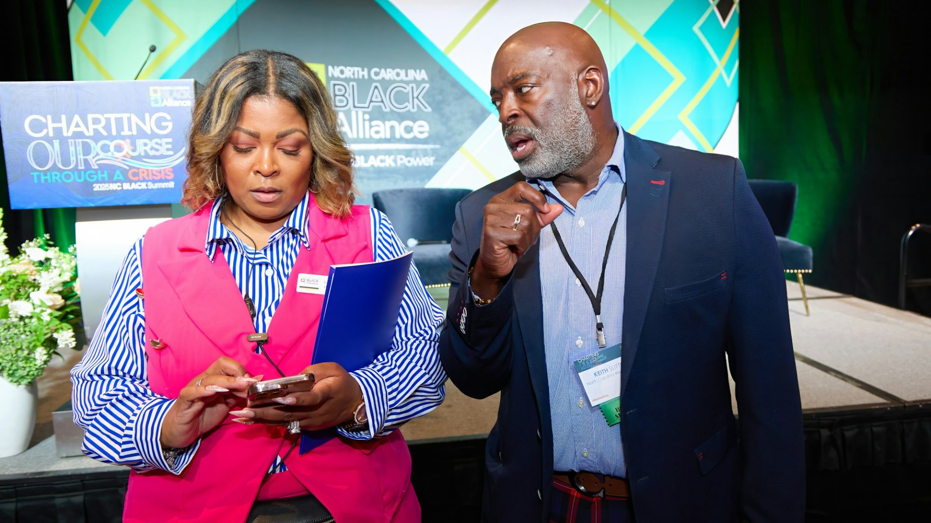 Katesha Phillips is smiling and engaging with North Carolina Black Alliance coworkers.